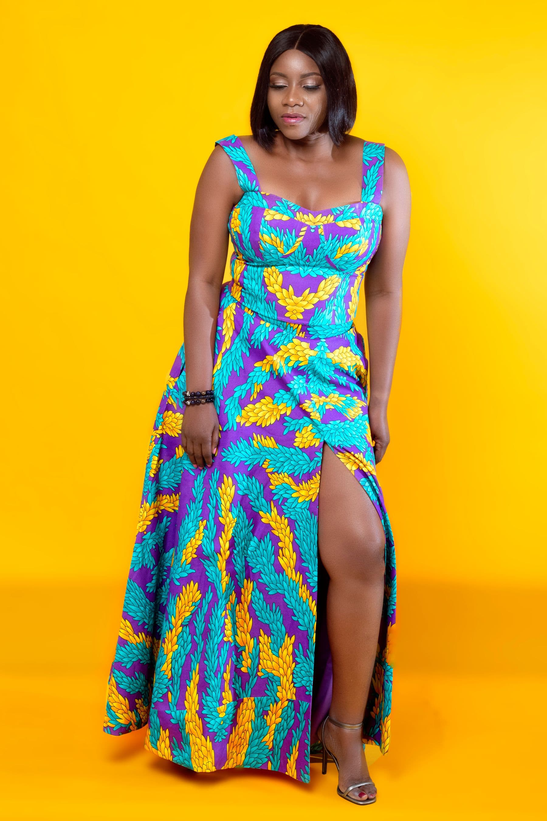 Concept lookbook portrait of a woman in a colourful statement dress