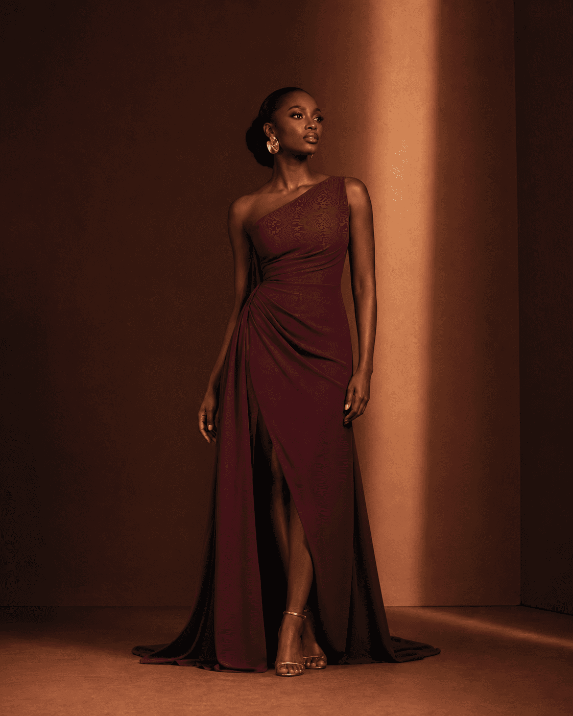 Concept presentation of a wine-coloured evening dress